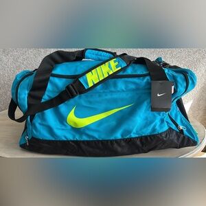 Nike Teal and Black Duffel Bag with Neon Accents